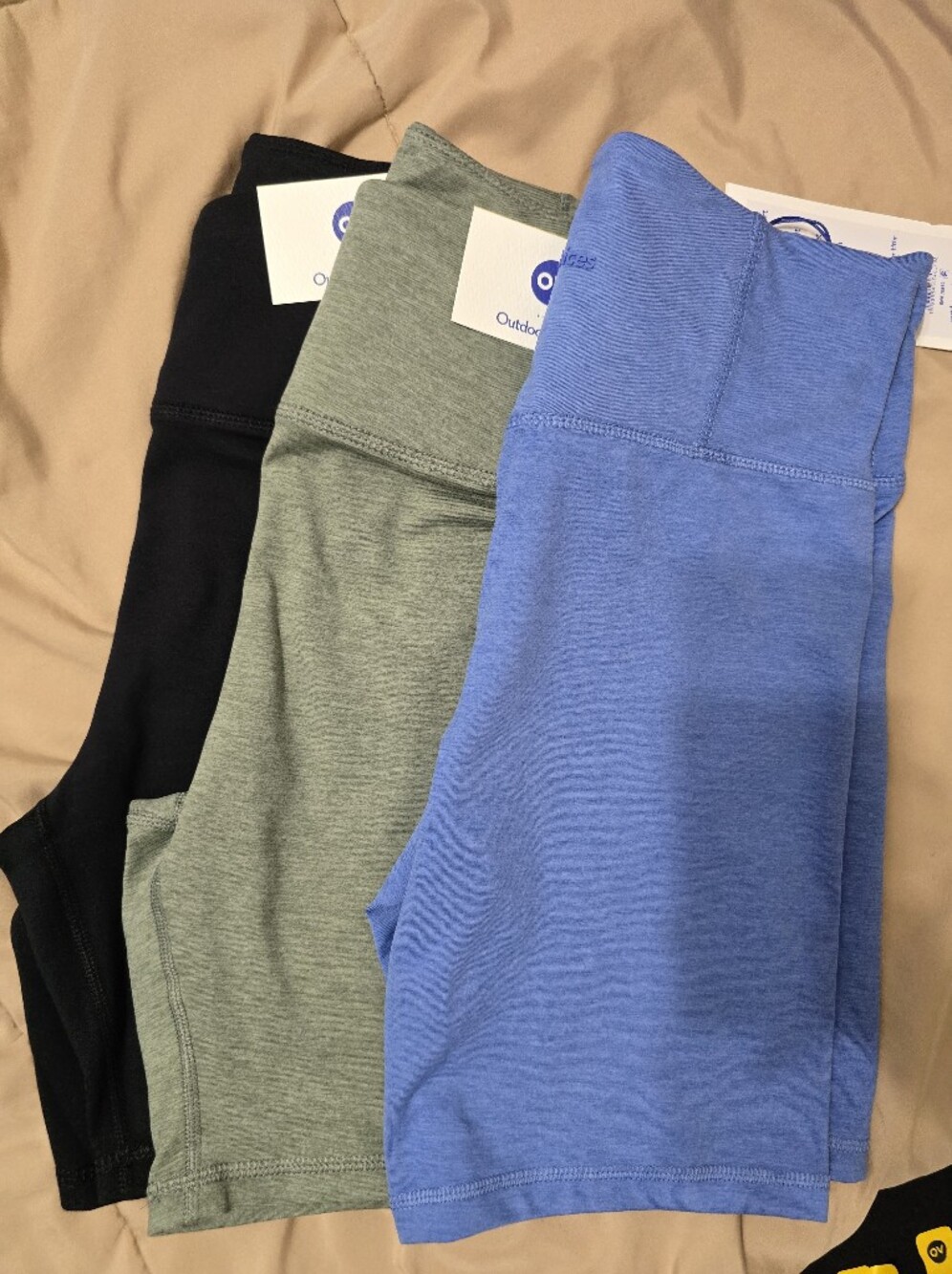 Outdoor Voices Bike Shorts Blue, Olive, and Black